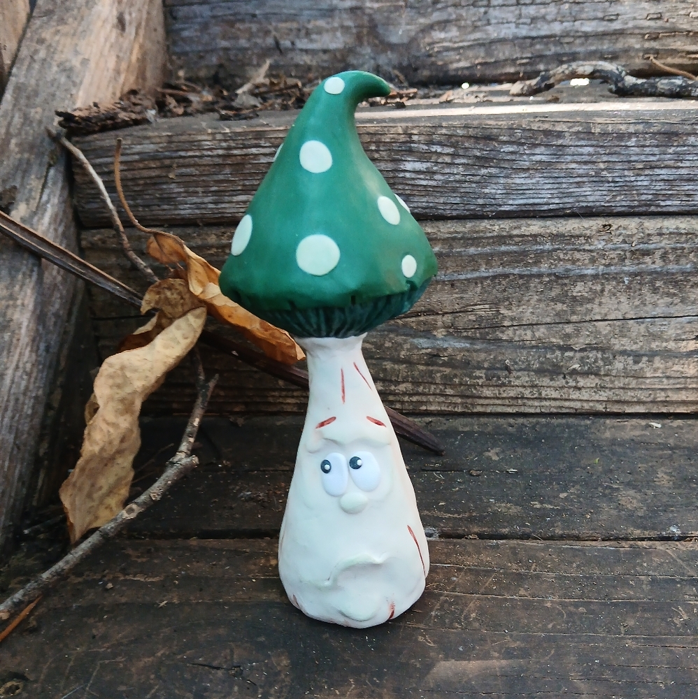 Whimsical Green and White Mushroom Sculpture